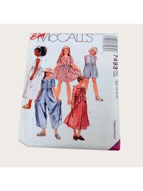 Vintage 1990s McCalls Sewing Pattern 7493 Girls Dress and Jumpsuit Size 10-14